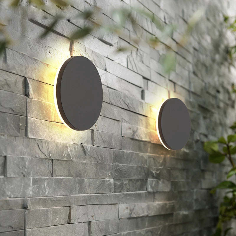 Minimalist round LED wall sconce