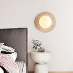 Natural travertine wall sconce
