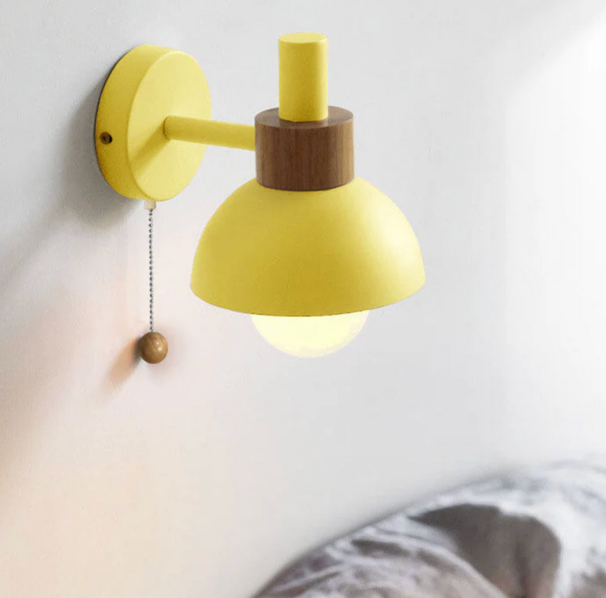 Pull-chain wall sconce with wooden accent