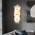 Organic stone-look LED wall sconce