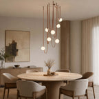 Cascading glass globe chandelier with leather straps