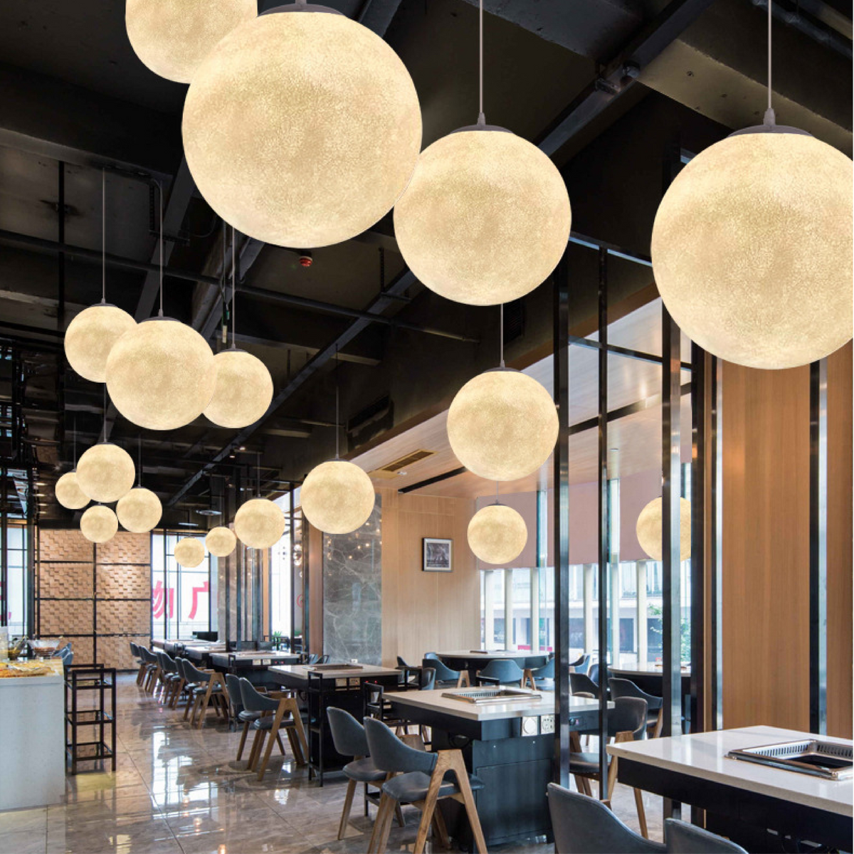 Lunar Glow moon pendant light with textured resin shade