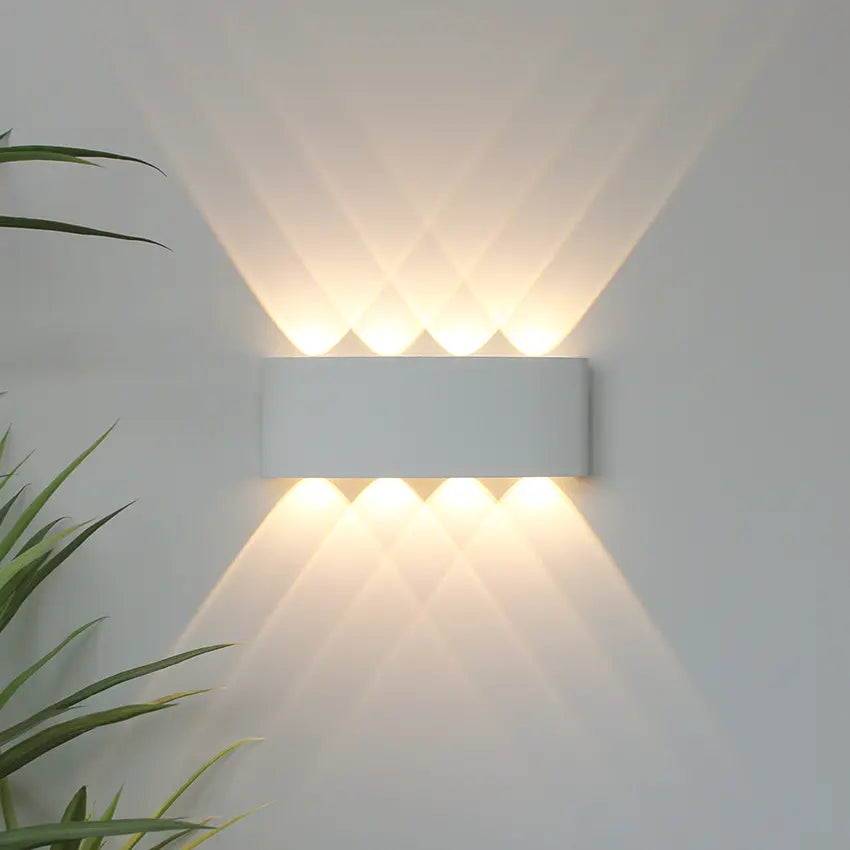 Geometric up-down LED wall light